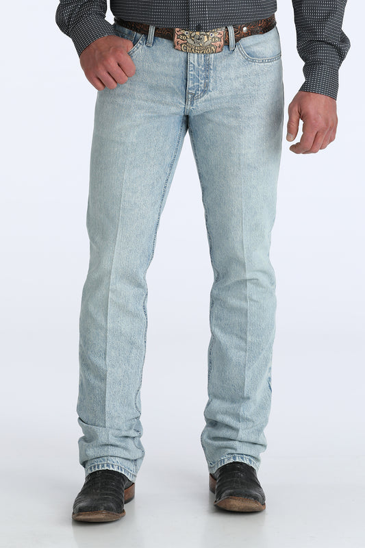 Light blue jeans worn by a person on a white background