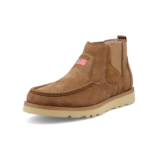 Brown suede shoe with American flag patch on a white background