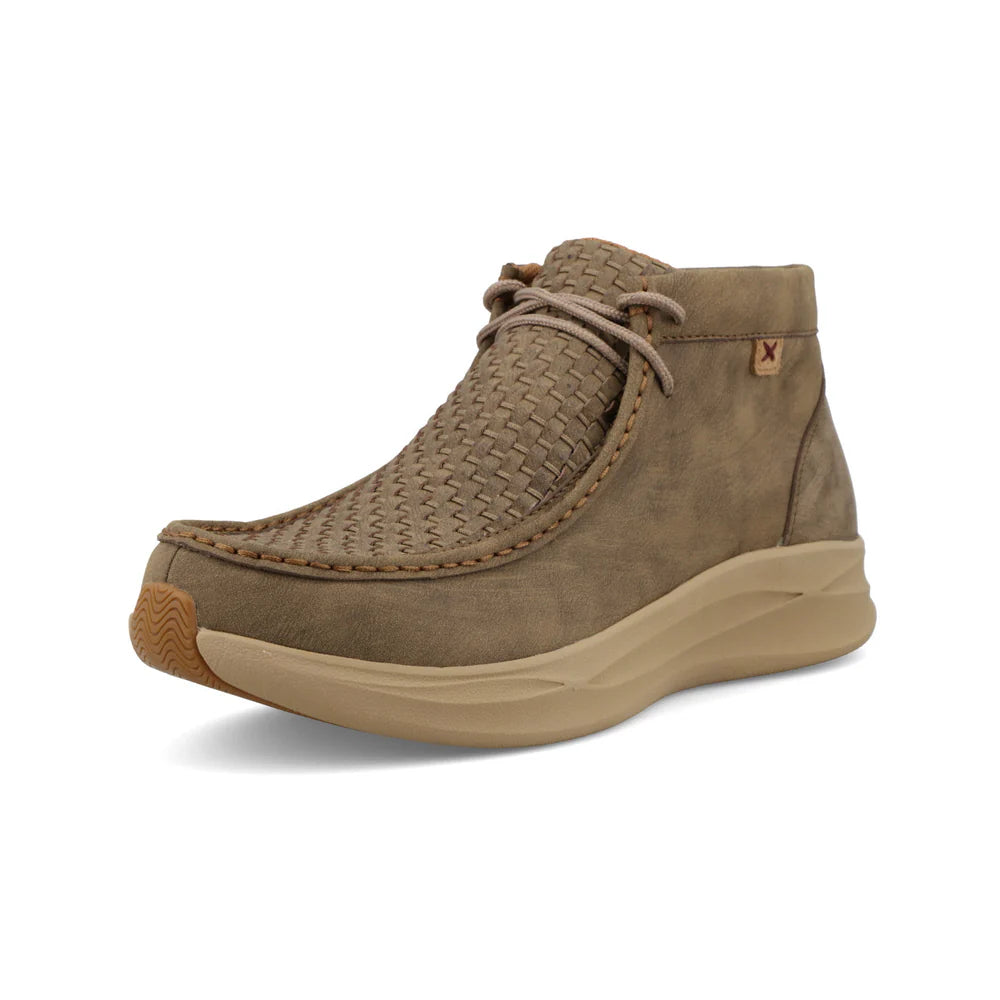 Brown shoe with textured pattern on a white background