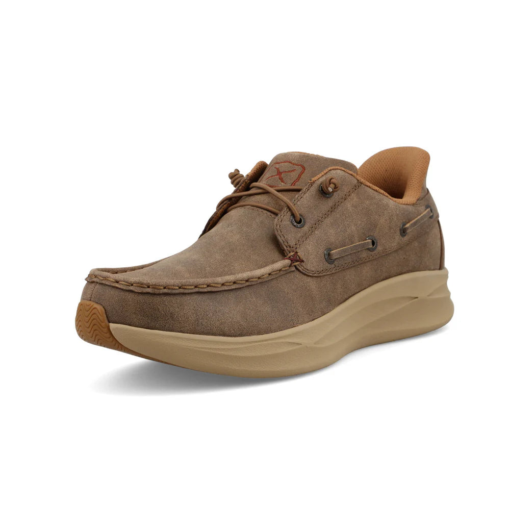 Brown leather shoe with tan sole on a white background