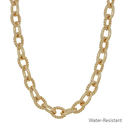 Gold chain necklace on a white background