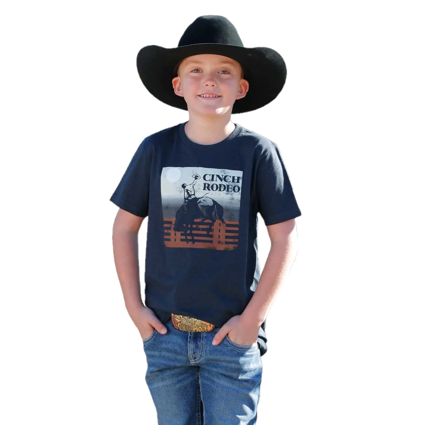 Child wearing a navy blue t-shirt with a graphic design and a black cowboy hat on a white background