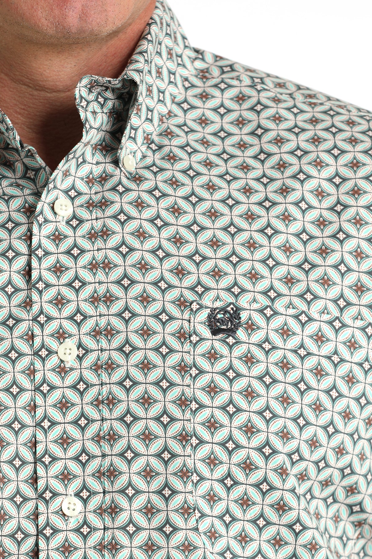 Men's geometric print button-up shirt with teal, brown, and white pattern
