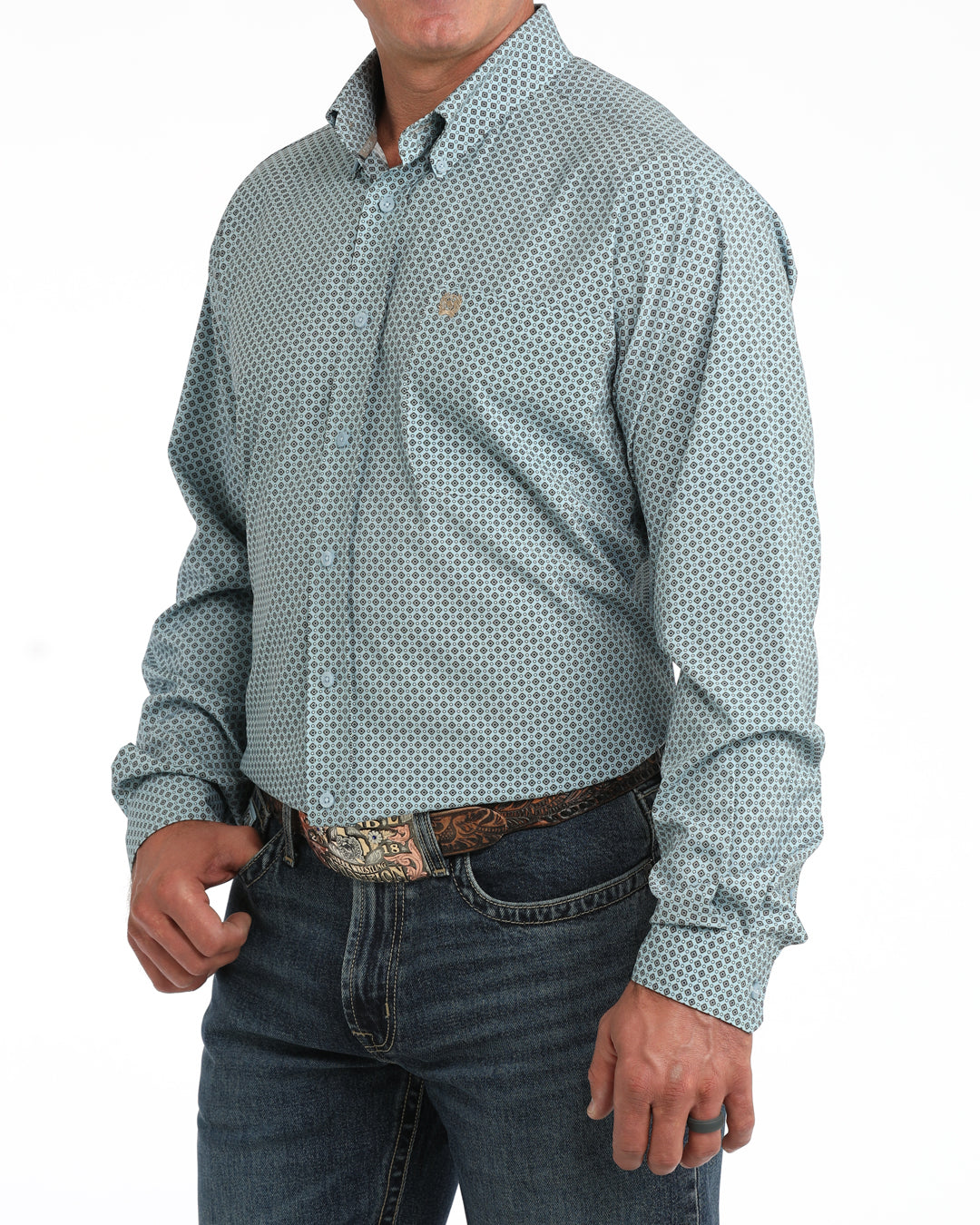 man wearing teal shirt white background