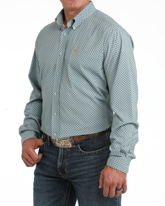 man wearing teal shirt white background