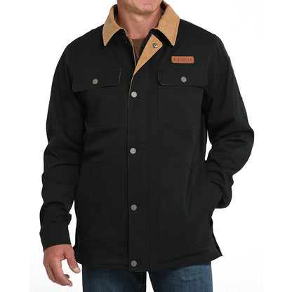 Men’s black work jacket with tan collar, snap buttons, and chest pockets
