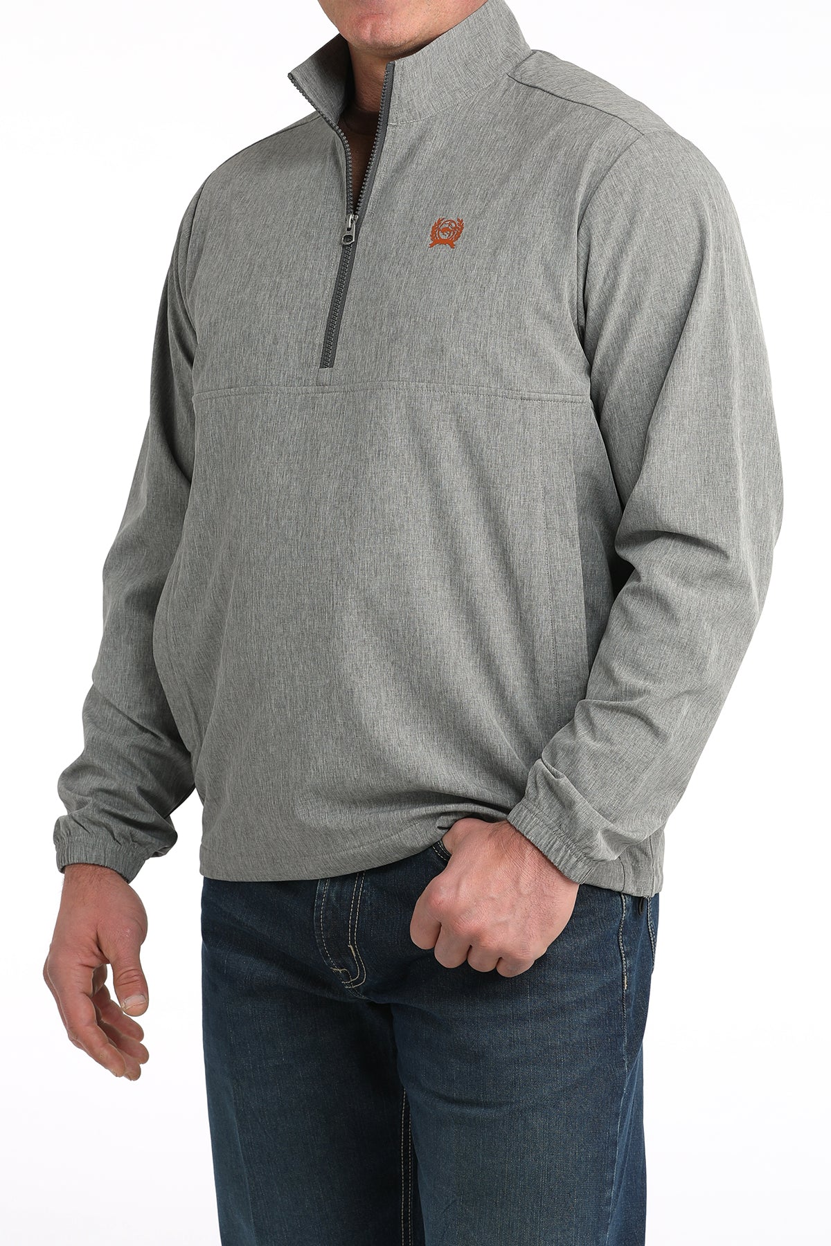Men’s grey quarter-zip pullover with elastic cuffs and embroidered chest logo, paired with jeans