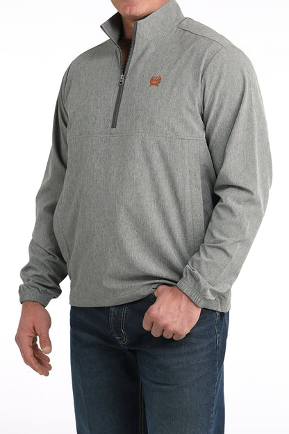 Men’s grey quarter-zip pullover with elastic cuffs and embroidered chest logo, paired with jeans