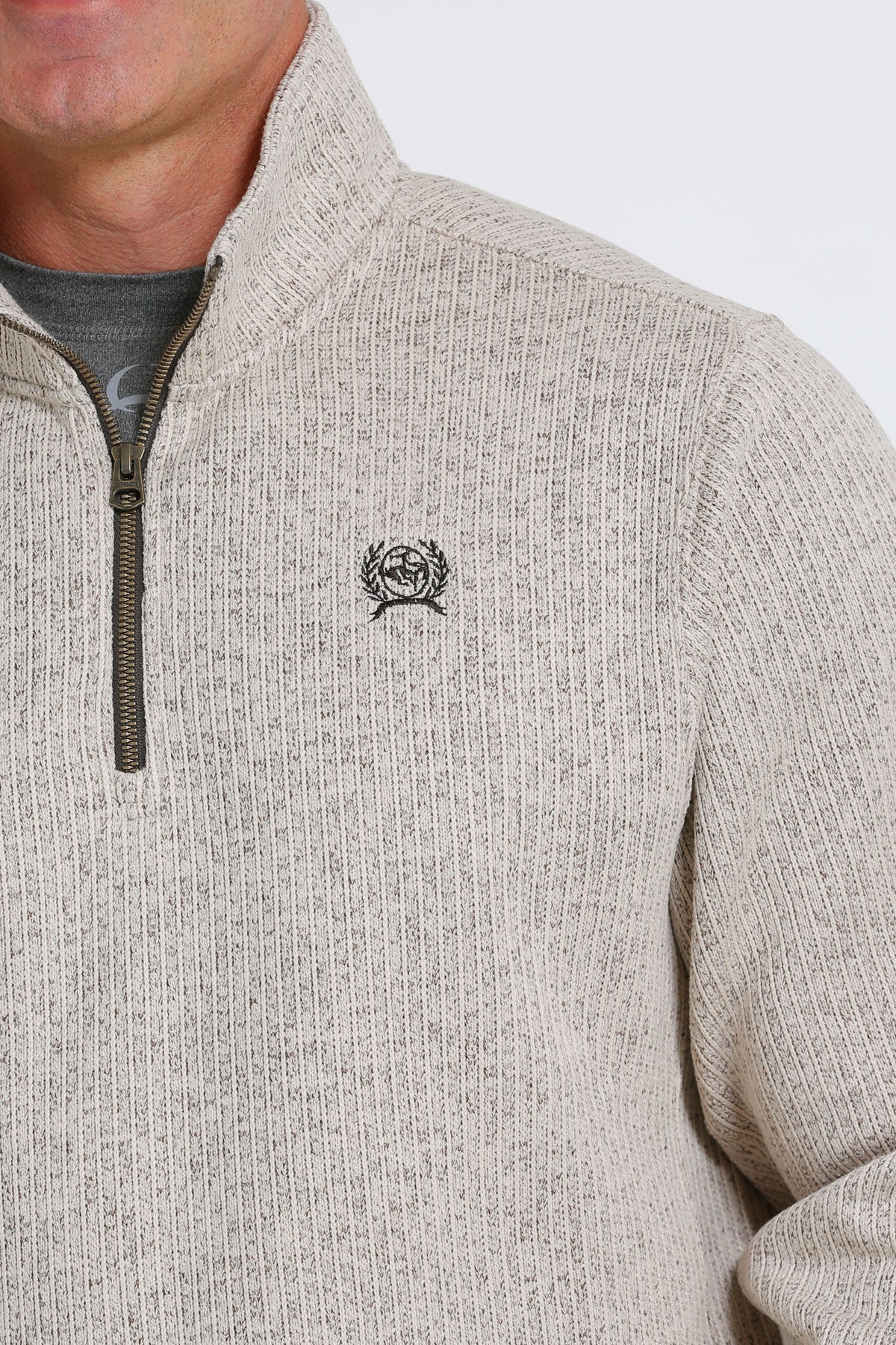 tan sweater with white background