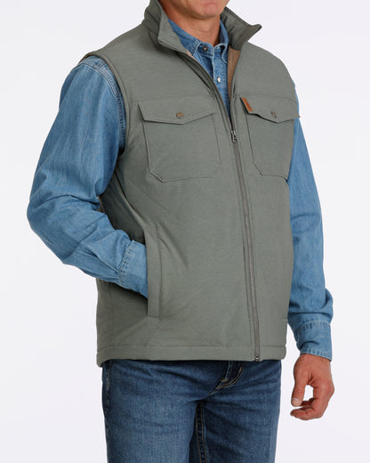 olive vest in white background