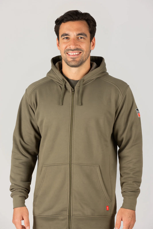 Man wearing a green hoodie with a brand logo on a gray background