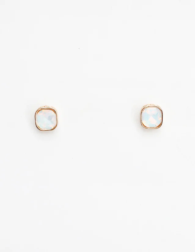 Pair of gold square earrings on a white background