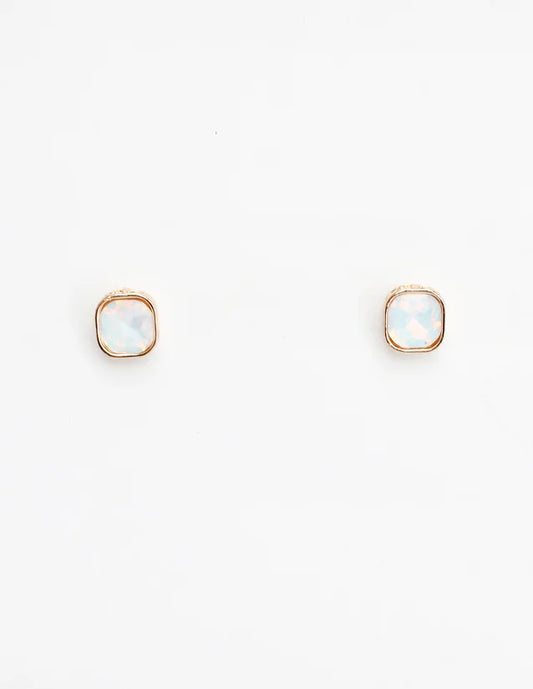 Pair of gold square earrings on a white background