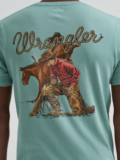 Teal t-shirt with a cowboy graphic and 'Wrangler' branding on the back.