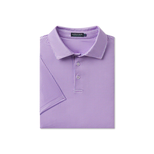 Folded purple checkered polo shirt on a white background