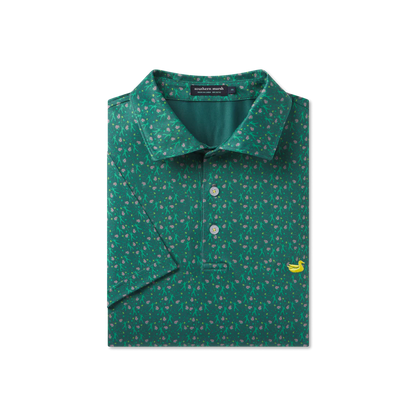 Green patterned polo shirt with a banana logo on a white background