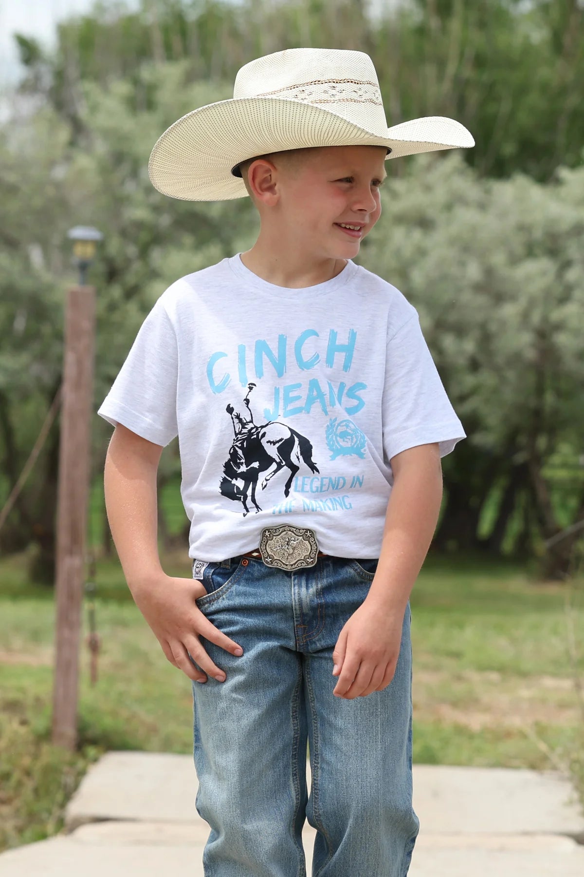 bot in cinch t shirt in an outdoor setting
