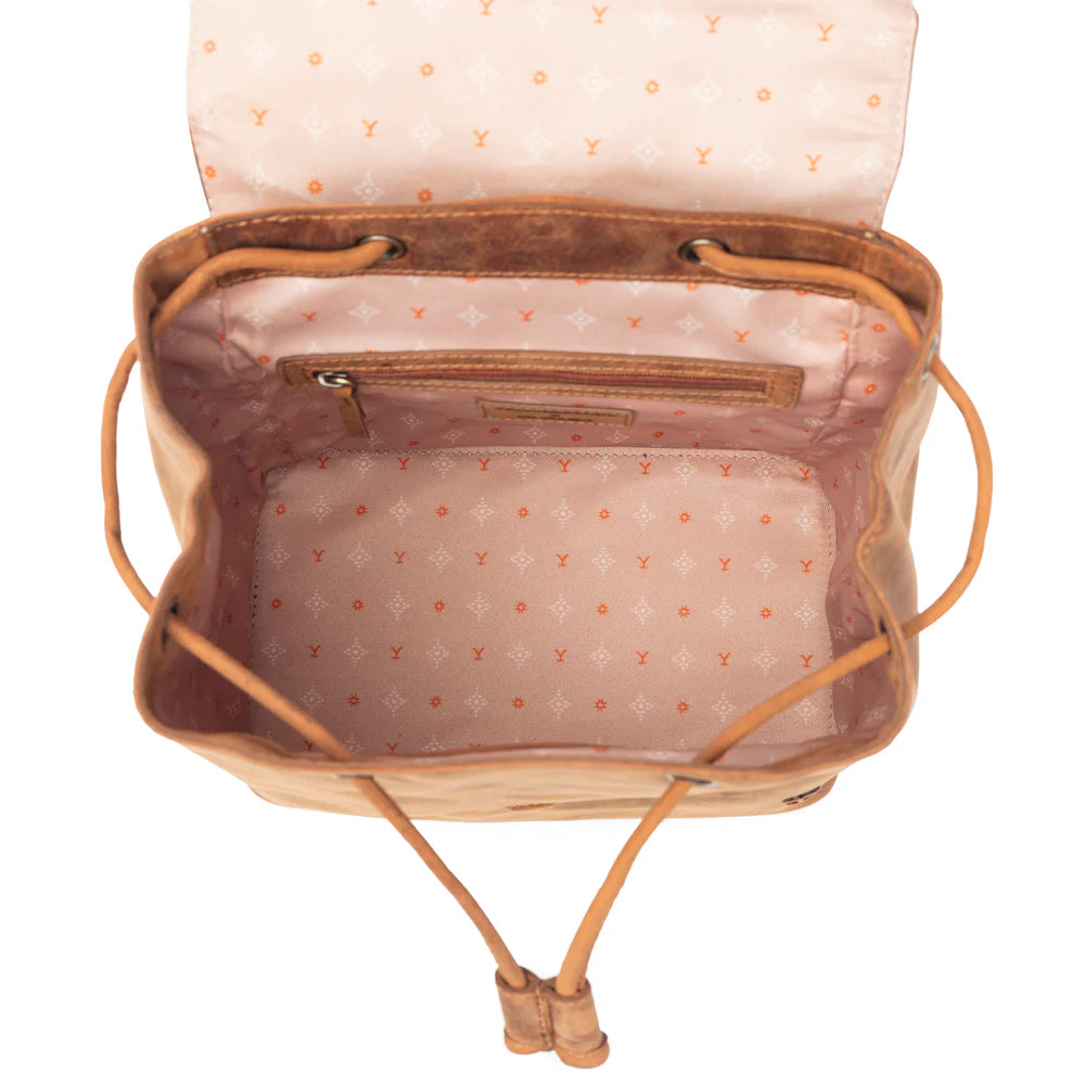 Open tan leather drawstring tote bag with patterned pink interior and inner zip pocket