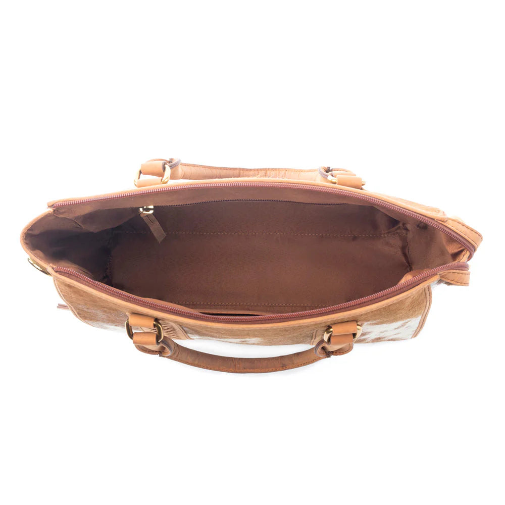 Top view of an empty brown leather handbag with spacious main compartment and zipper closure