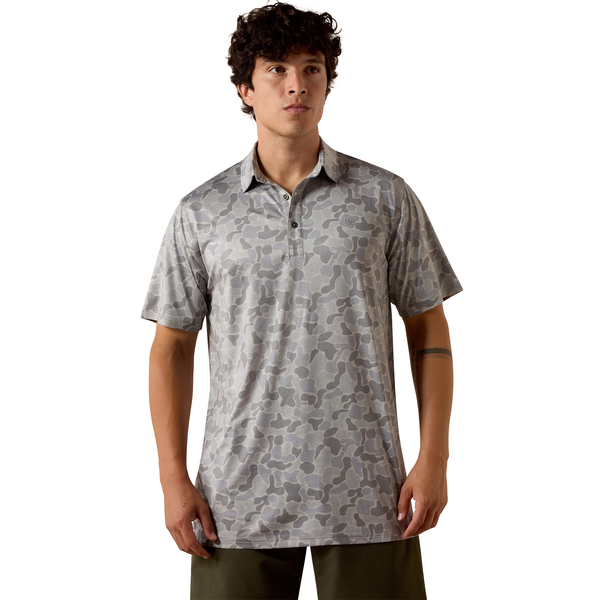 Man wearing a patterned shirt on a white background