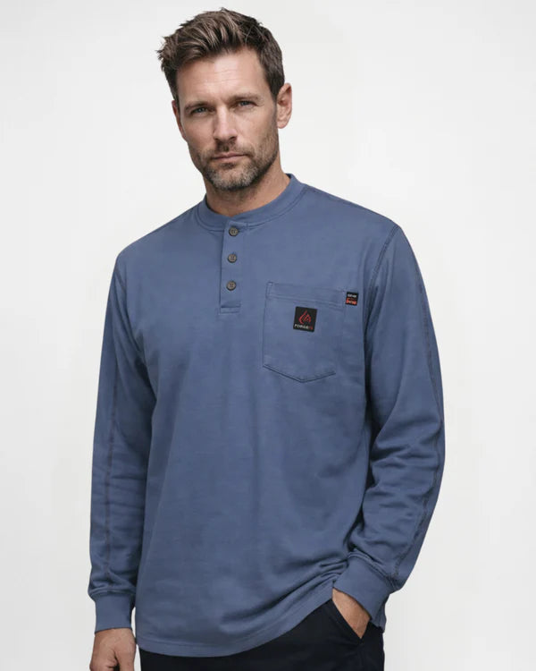 Man wearing a blue long-sleeve henley shirt with a logo on a white background