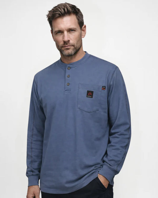 Man wearing a blue long-sleeve henley shirt with a logo on a white background
