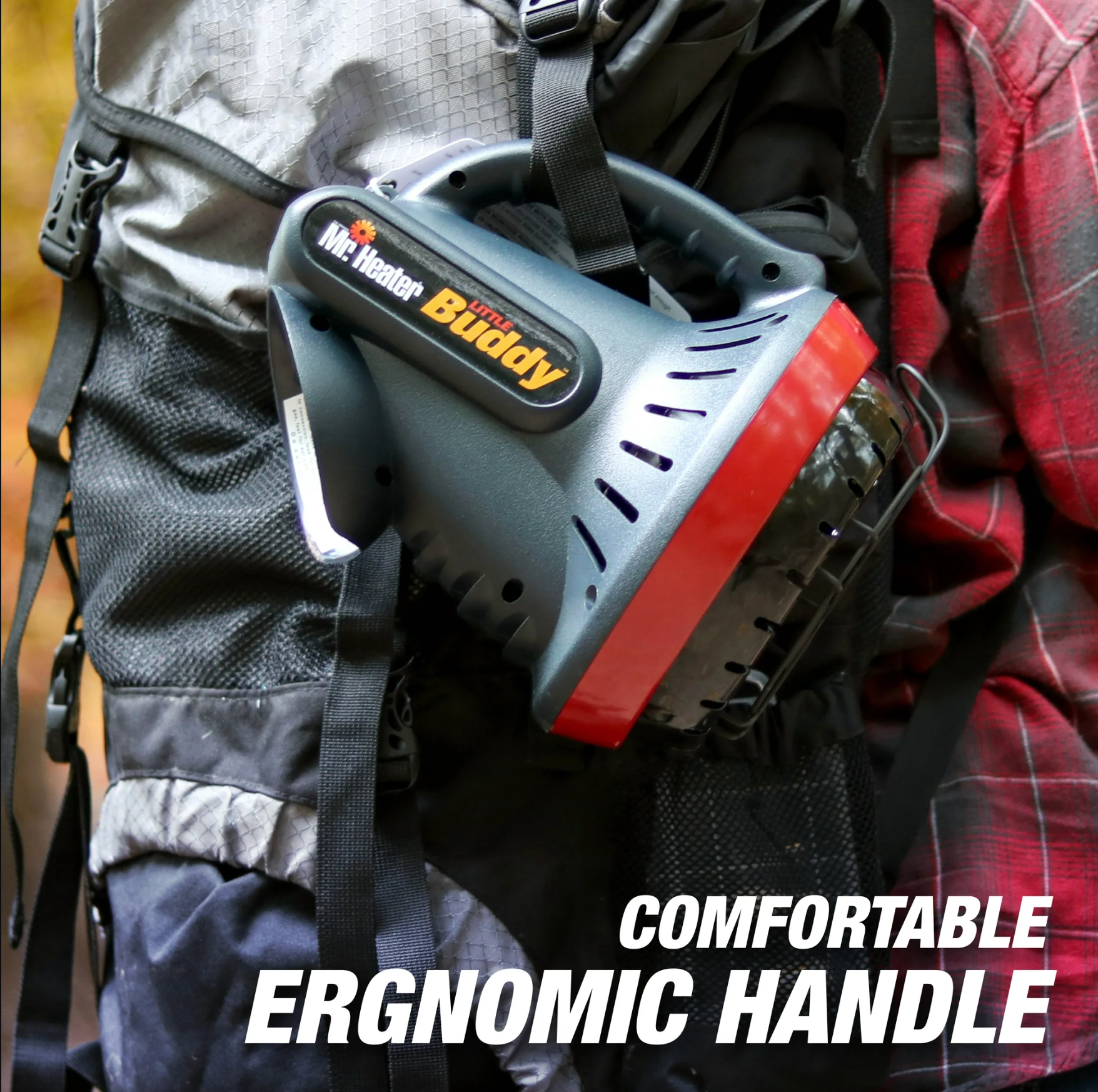 Portable Mr. Heater Little Buddy propane heater clipped to a hiking backpack outdoors