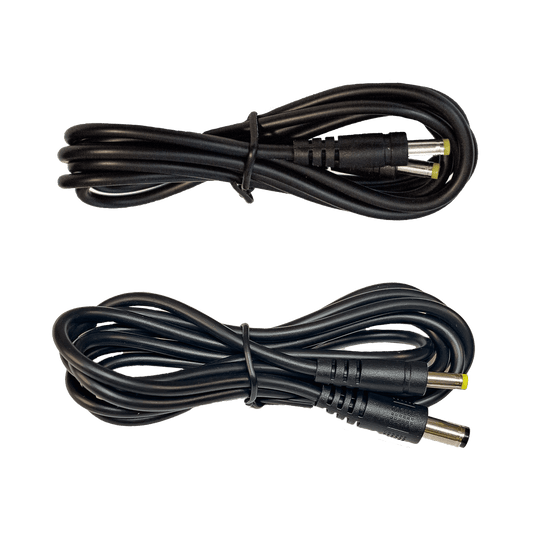 Two black cables with power connectors on a white background