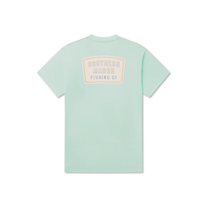 Light blue t-shirt with a logo on the back against a white background