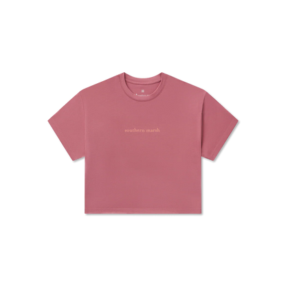 Pink t-shirt with 'southern marsh' text on a white background