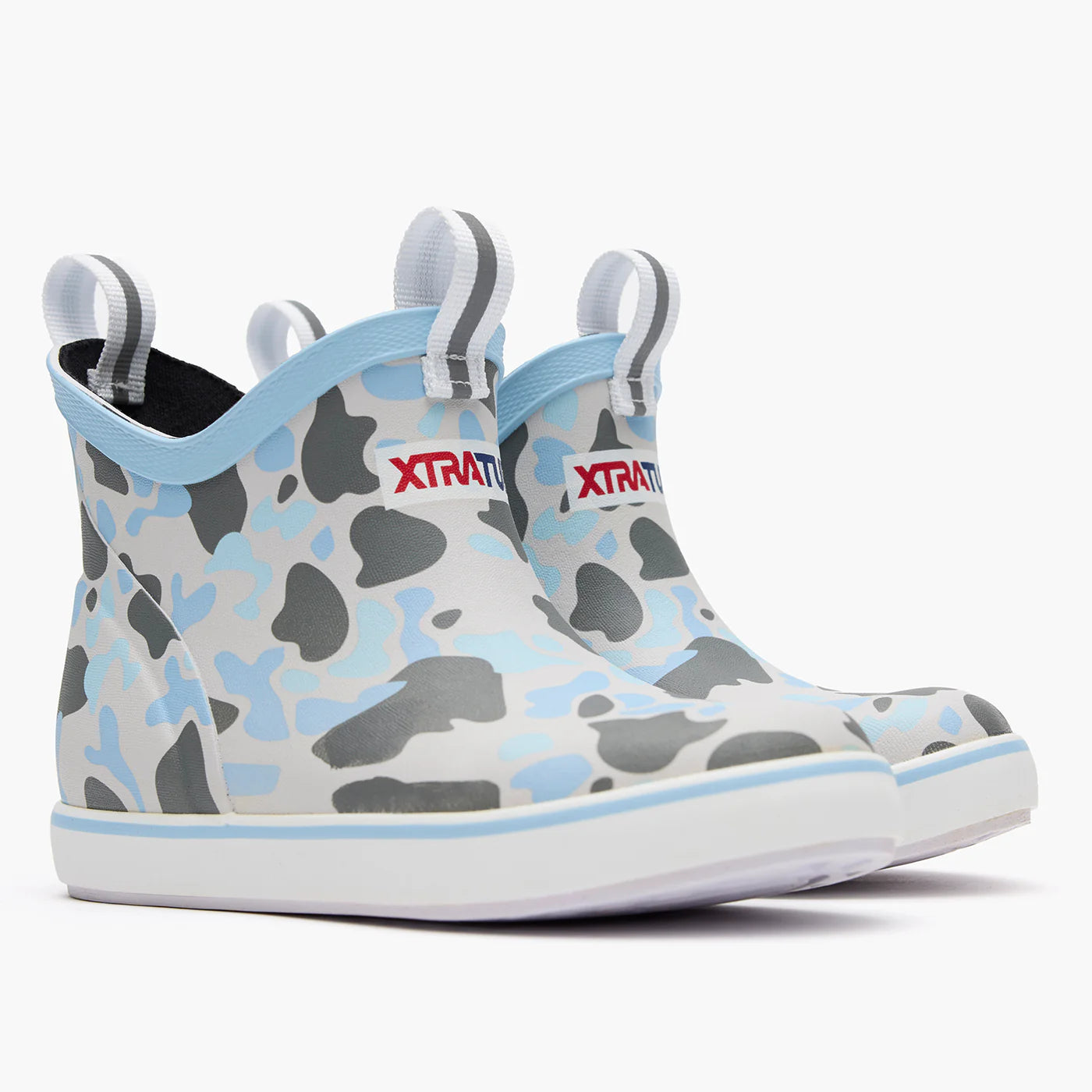 Blue and grey camo waterproof ankle boots with pull tabs and white soles