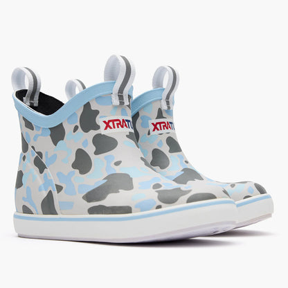 Blue and grey camo waterproof ankle boots with pull tabs and white soles