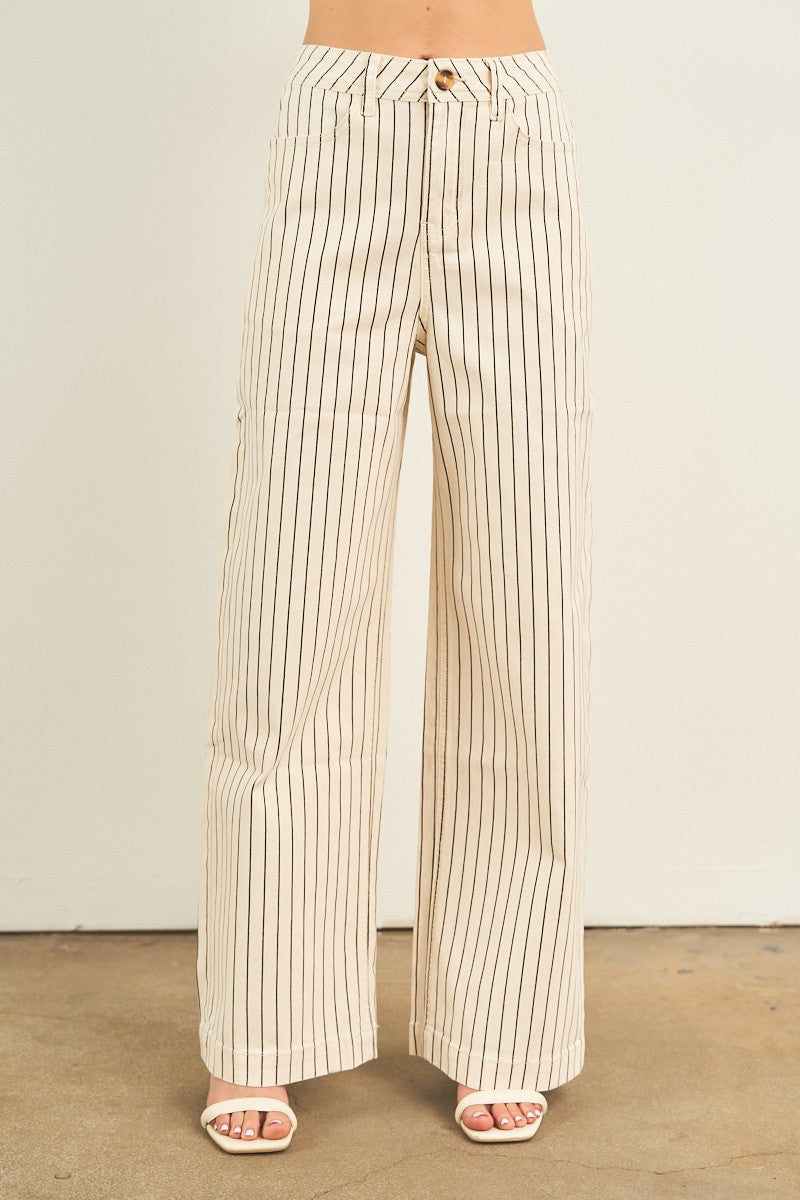 Striped wide-leg pants worn by a person on a plain background