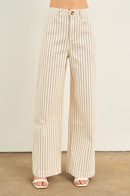 Striped wide-leg pants worn by a person on a plain background