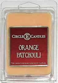 Circle E Candles orange patchouli scented wax melt in clear clamshell packaging