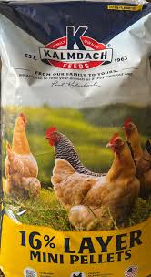 Bag of 16% layer mini pellets chicken feed with chickens on field and yellow packaging