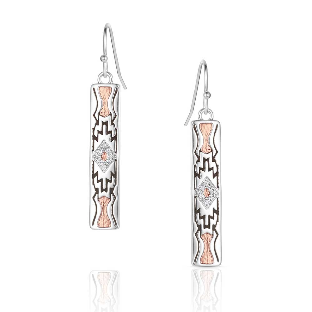 Pair of silver and rose gold earrings with geometric designs on a white background