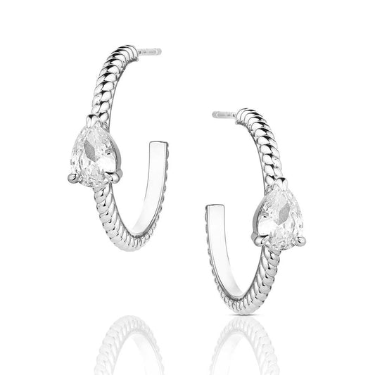 Pair of silver hoop earrings with clear gemstones on a white background