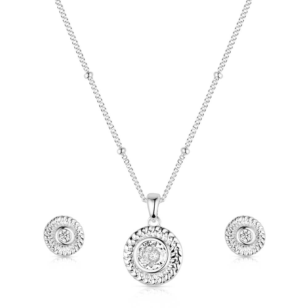 Silver jewelry set with necklace and earrings on a white background