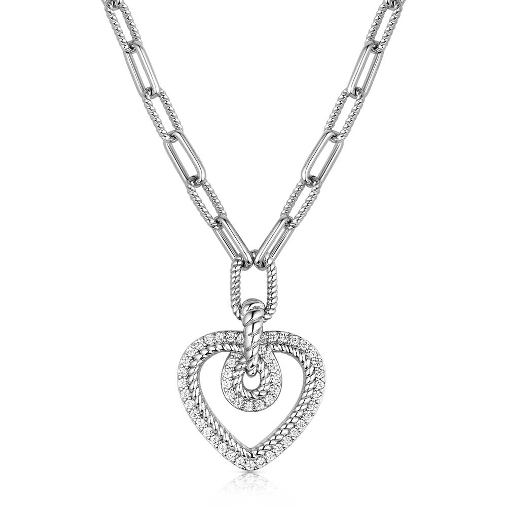 Silver heart-shaped pendant necklace on a white background
