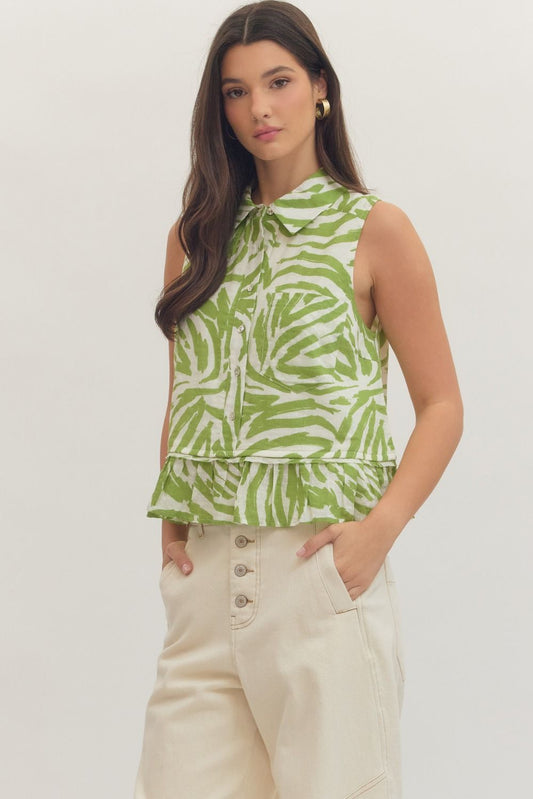 print sleeveless top featuring ruffle hem