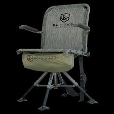 A folding outdoor chair with a camouflage-patterned backrest and a tan seat cushion, featuring the 'Back & Bends' brand logo on the backrest and side pocket, set against a solid black background.