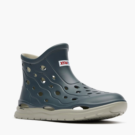 Blue water shoe with Xtratuf logo on a white background